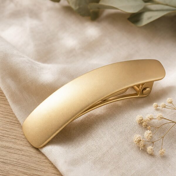 Matt-goldene geschwungene Haarspange Grace